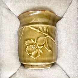 engraved camellia jianzhan sharing cup